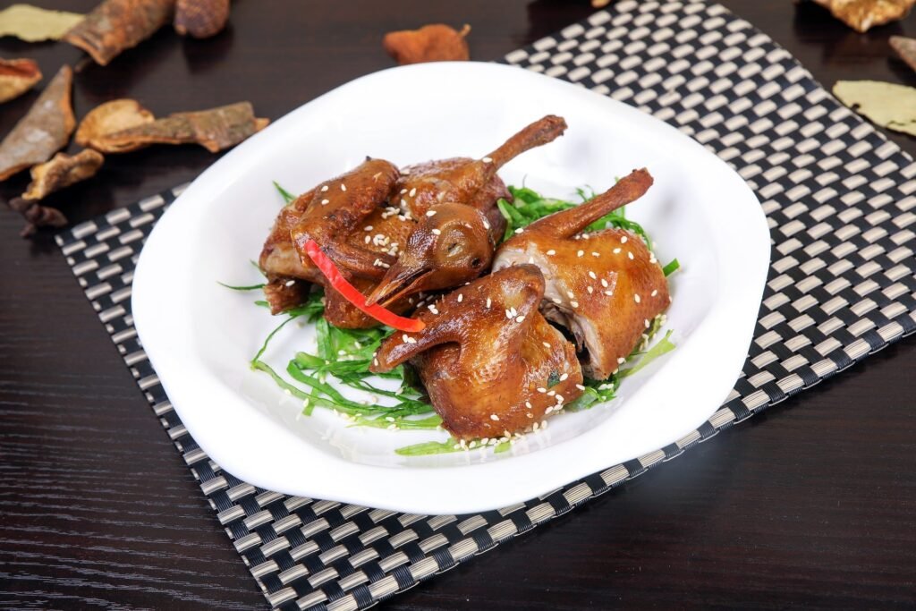 Cantonese cuisine, Red Braised Squab (Pigeon) dish, beautifully presented