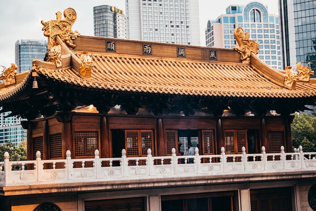 Jing'an Temple stands in stark contrast to the surrounding high-rise buildings