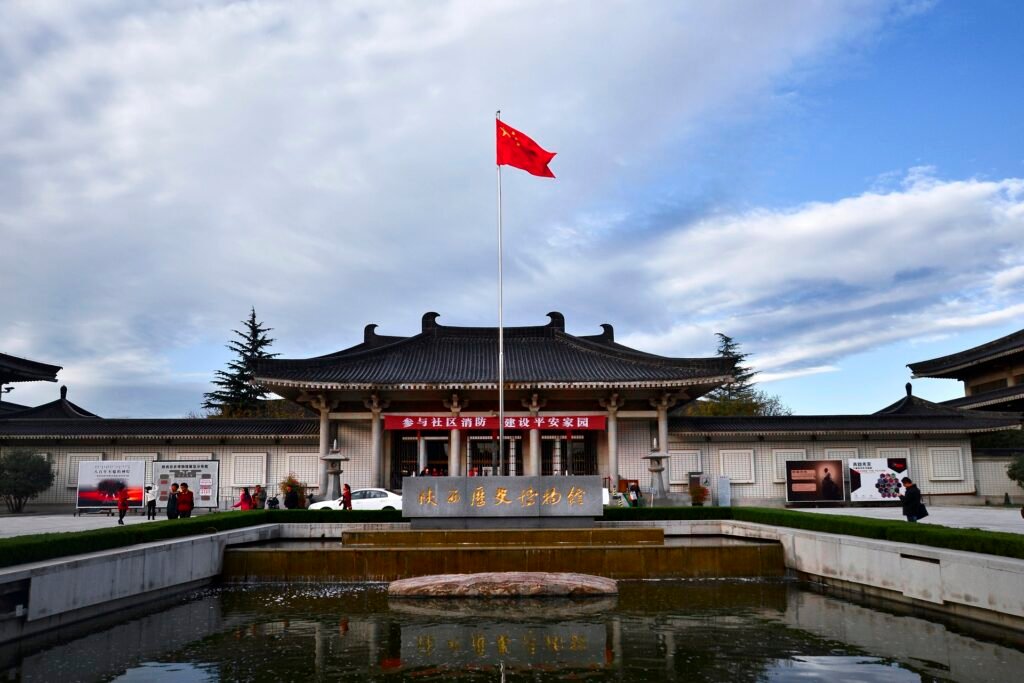 Shaanxi History Museum, a cultural treasure in Xi'an, captured under a clear blue sky with fluffy clouds