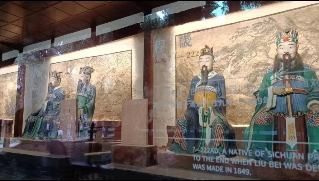 The museum displays lifelike figures behind glass