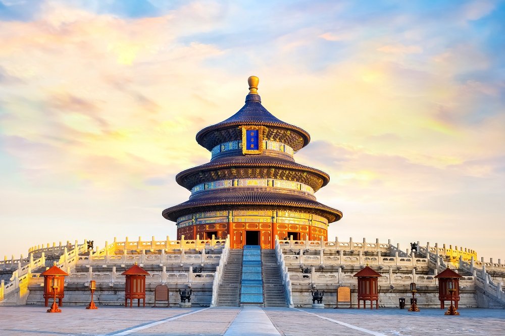 The light of the setting sun shines on the Temple of Heaven, as if it has been put on a golden coat