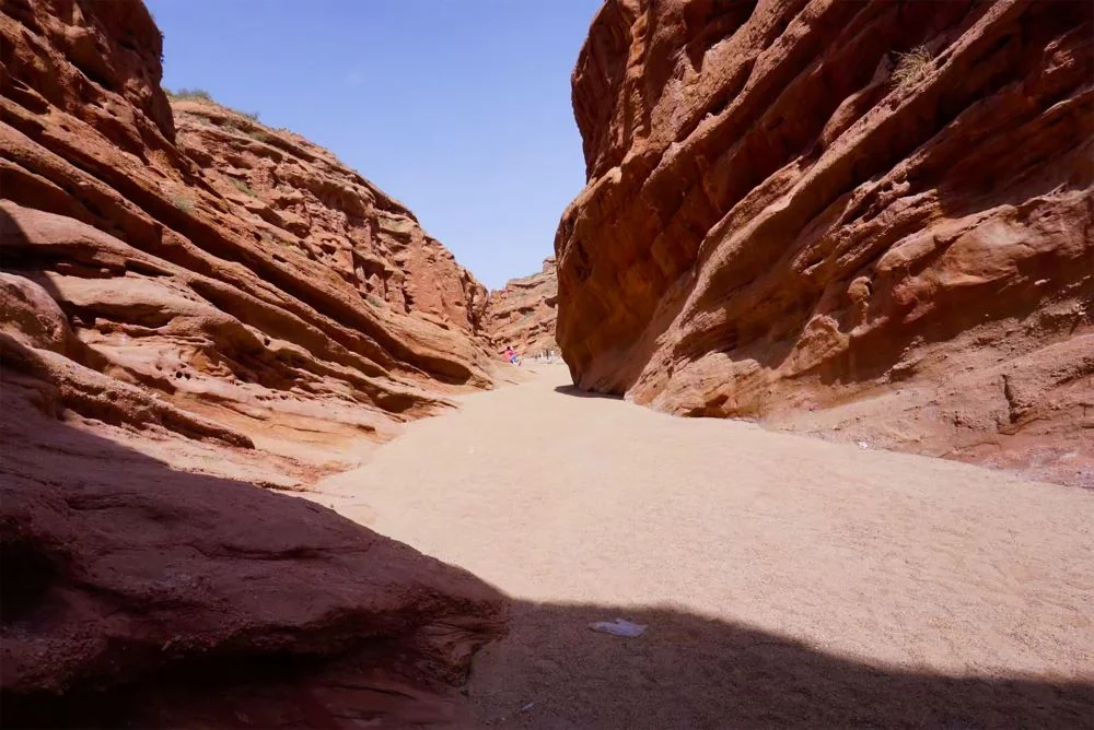 Stunning view of the Grand Canyon's red sandstone cliffs in Xinjiang