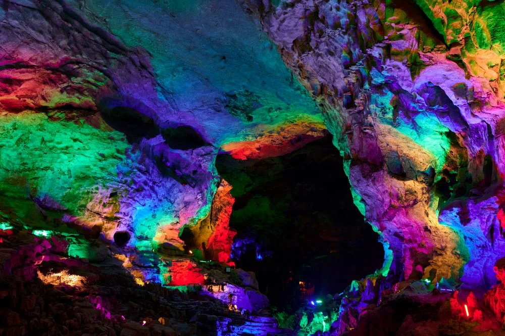 Vibrant natural formations in a multicolored stone cave, showcasing geological wonders